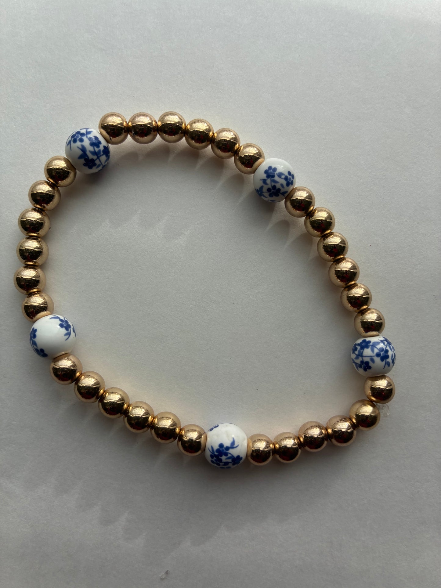 Blue and gold flower beaded bracelet